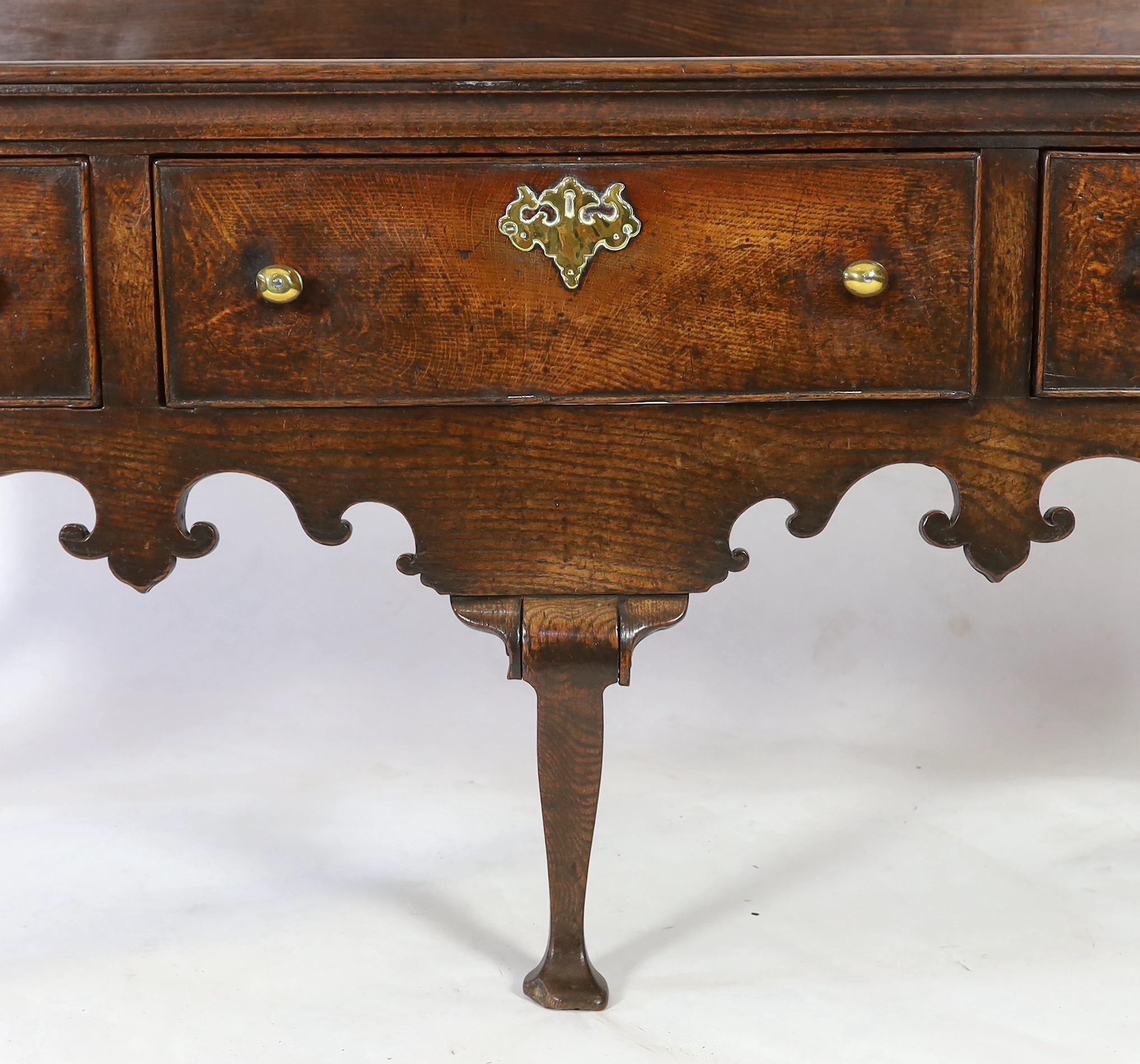 A late 18th century oak dresser base